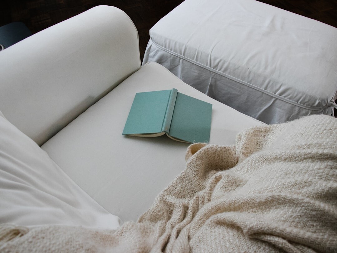 person reading book in quiet room